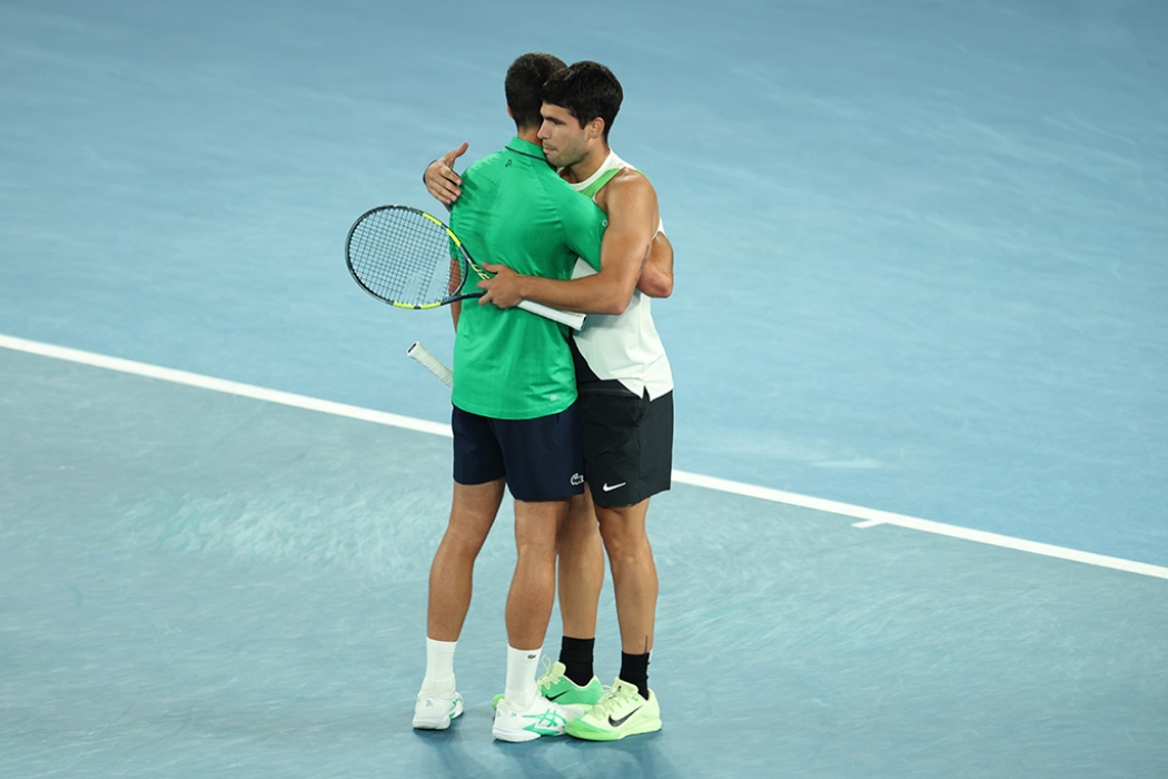 Carlos Alcaraz and Novak Djokovic embrace after the Australian Open 2026 final