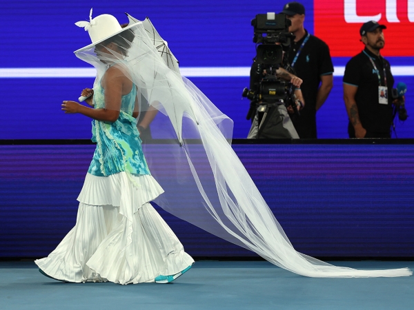 Naomi Osaka enters Rod Laver Arena for her first-round match at AO 2026