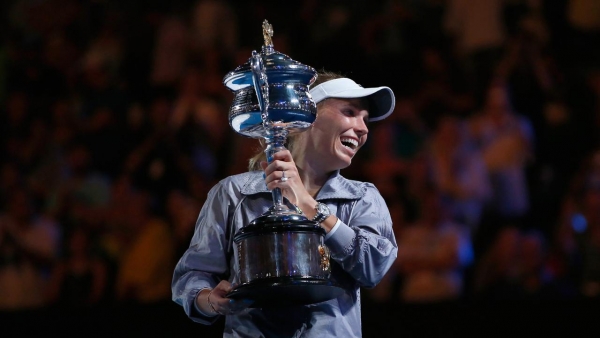The crowd serenade Wozniacki after winning the final